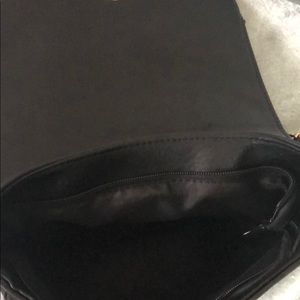 Tassel saddle cross body bag